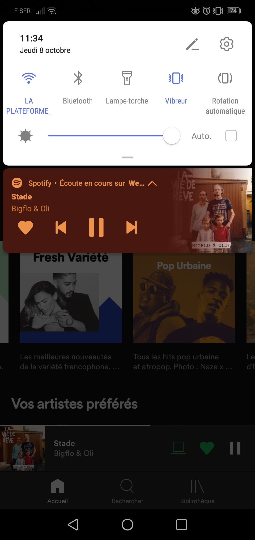 L'affichette de Spotify dans la partie notif du téléphone